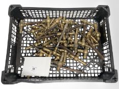 A crate of vintage brass door handles.