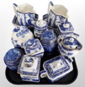 A group of Ringtons blue and white caddies, teapots, bowls, etc.