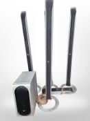 A six-piece LG surround sound speaker system.