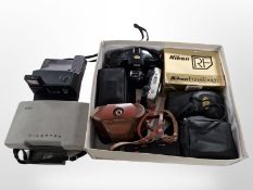 A small quantity of vintage cameras including Polaroid, Nikon, etc.