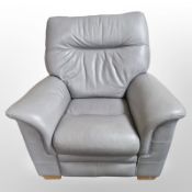 A grey stitched leather armchair,