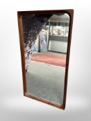 A 1970s Danish teak mirror, 46cm x 83cm.