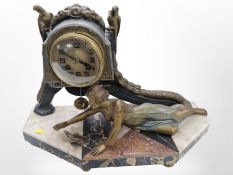 An Art Deco spelter and marble figural mantel clock, width 45cm, with pendulum.