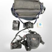 A Nikon D70 camera with battery charger and Sigma 35-70 lens and Minolta 7000 camera with 35-70