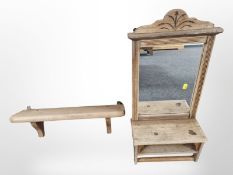 A pine mirrored wall shelf,