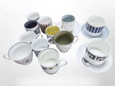 A collection of Susie Cooper porcelain teacups, coffee cans and saucers.