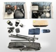 A collection of camera equipment, Benbo Mk1 tripod in carry bag, Vivitar flash guns,