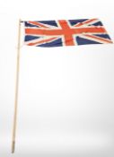 A large British Union Flag on pole, flag approximately 170cm x 85cm.