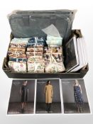 A quantity of 100% cotton fat quarter packs, Avid Seamstress sun dress guides,