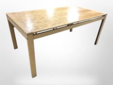 A Danish A/S Mogenskold dining table,