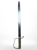 A British 1856 pattern Pioneer's sidearm short sword with saw-back blade and brass hilt,