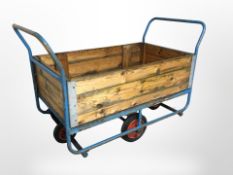 A metal and pine goods trolley,