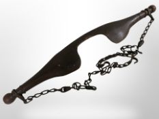A 19th-century pine yoke, width 90cm.