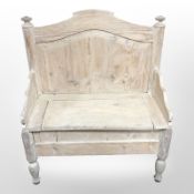 A washed pine box settle,