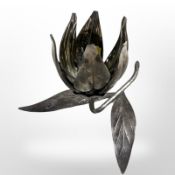 A silver-plated cigarette stand