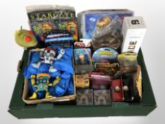 A group of toys including Star Wars, Disney, Star Gate,