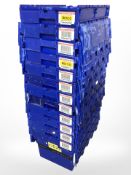 Twelve stackable plastic storage boxes with folding lids,