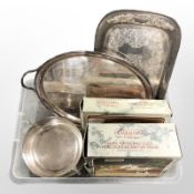 A group of silver-plated serving trays, hors d'oeuvre trays, some pieces boxed.