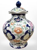 A Chinese bulbous porcelain jar and cover, height 42cm.