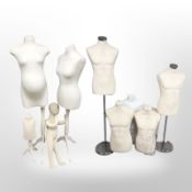 A group of various mannequins,