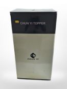 A Chunyi memory foam topper, in box.