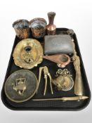 A group of metal wares including a pair of Arts and Crafts embossed and pierced copper pots,