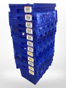 Twelve stackable plastic storage boxes with folding lids,