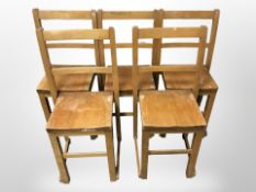 A set of five vintage school chairs