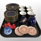 28 pieces of Bing & Grøndahl blue and gilt tea china, together with a further Christmas tree bell,