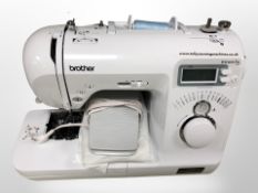 A Brother Innov-IS 15 electric sewing machine with lead and pedal