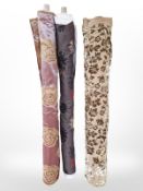Three rolls of upholsterer's fabric / material, width approximately 140 cm, length unknown.