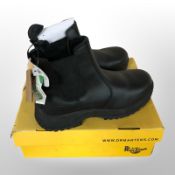 A pair of Dr Martens boots size 9 with retail tags