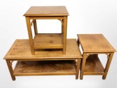 A reproduction yew wood rectangular coffee table,