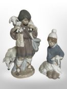 A Lladró figure of a shepherd boy carrying a lamb, No.