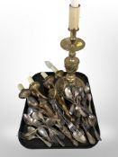 A large ornate brass lamp base,