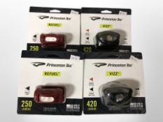 Four Princeton Tec LED head lamps, in retail condition.