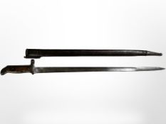 A Danish M 1915 sword bayonet for the Krag-Jorgensen rifle, with steel-mounted leather scabbard,