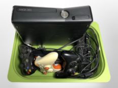 An Xbox 360 console,
