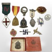 A group of medals including Masonic Institutes for Girls and Boys, a Scottish Clan Macpherson badge,