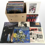 A quantity of vinyl LP records to include KISS, Ozzy Osbourne, Iron Maiden, Rush, Bon Jovi, U2,