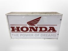 A Honda illuminated sign,