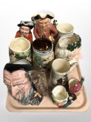 Royal Doulton Bacchus and Merlin Character jugs, two other miniature examples, Doulton jug,