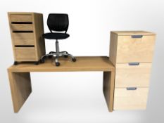 An oak veneered desk, similar pedestal, three drawer cabinet,