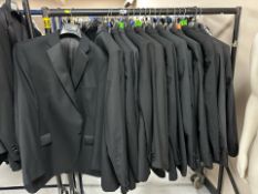 A rail of Gent's black tuxedo jackets,