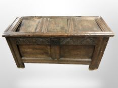 A George III panelled oak coffer,
