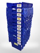 Twelve stackable plastic storage boxes with folding lids,
