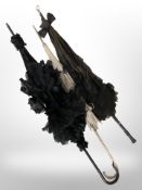 Three vintage parasols.