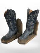 A pair of cowboy boot bookends,