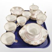 21 pieces of Regency bone tea china.