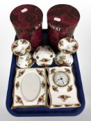 A pair of Royal Albert Old Country Roses porcelain candlesticks, boxed,